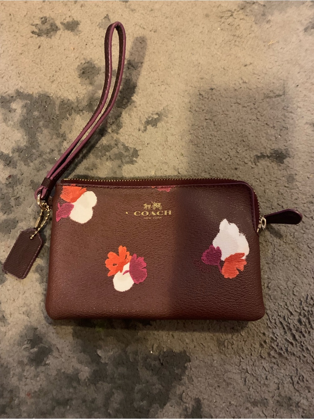 COACH Burgundy Floral Leather Wristlet with Gold Logo